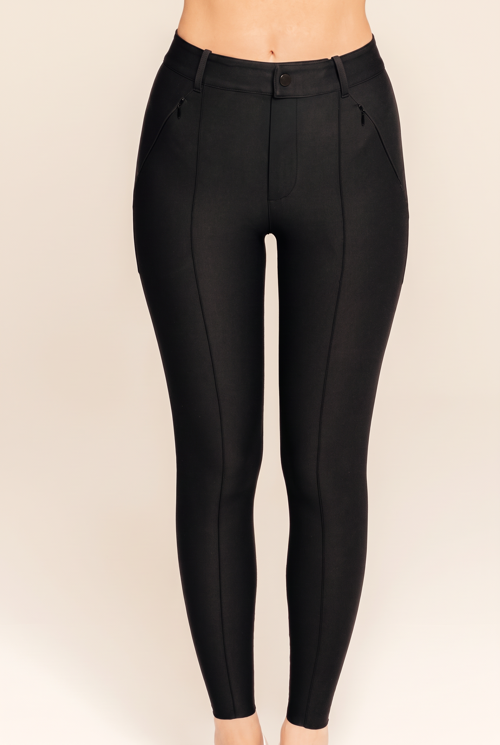 Close-up of Tression compression trousers from waist to ankle